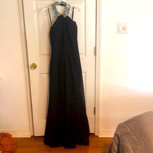NWOT.  Formal length black chiffon gown strapless with jeweled neckline.
